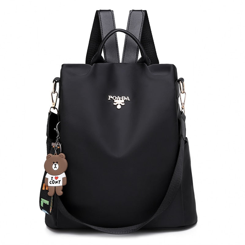 Elegant women's anti-theft backpack, water-resistant, secure hidden pockets for valuables, ideal for travel.