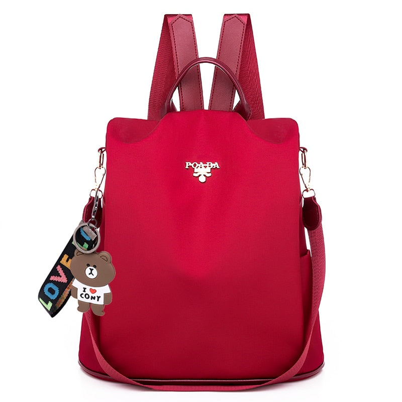 Organized women's anti-theft backpack, water-resistant, with secure hidden back pockets for daily essentials.