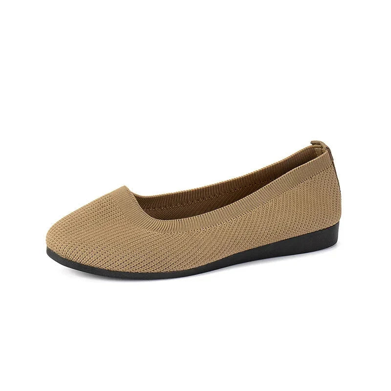 Pair of comfortable women's ballerina flats, designed for breathable summer style and versatile daily wear.