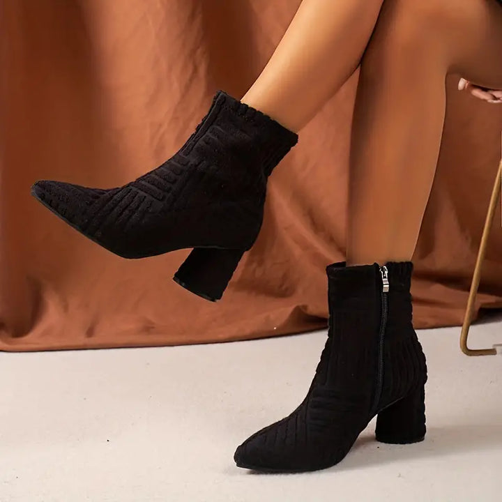 Stylish women's black block heel boots with pointed toe. Comfortable Selene zipper boots for all-season fashion.