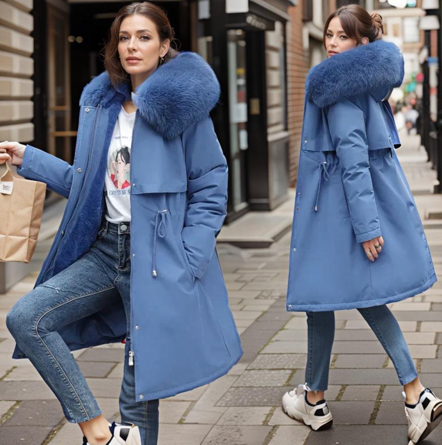 Stylish women's black winter coat. Warm, insulated, & waterproof for cold weather fashion.