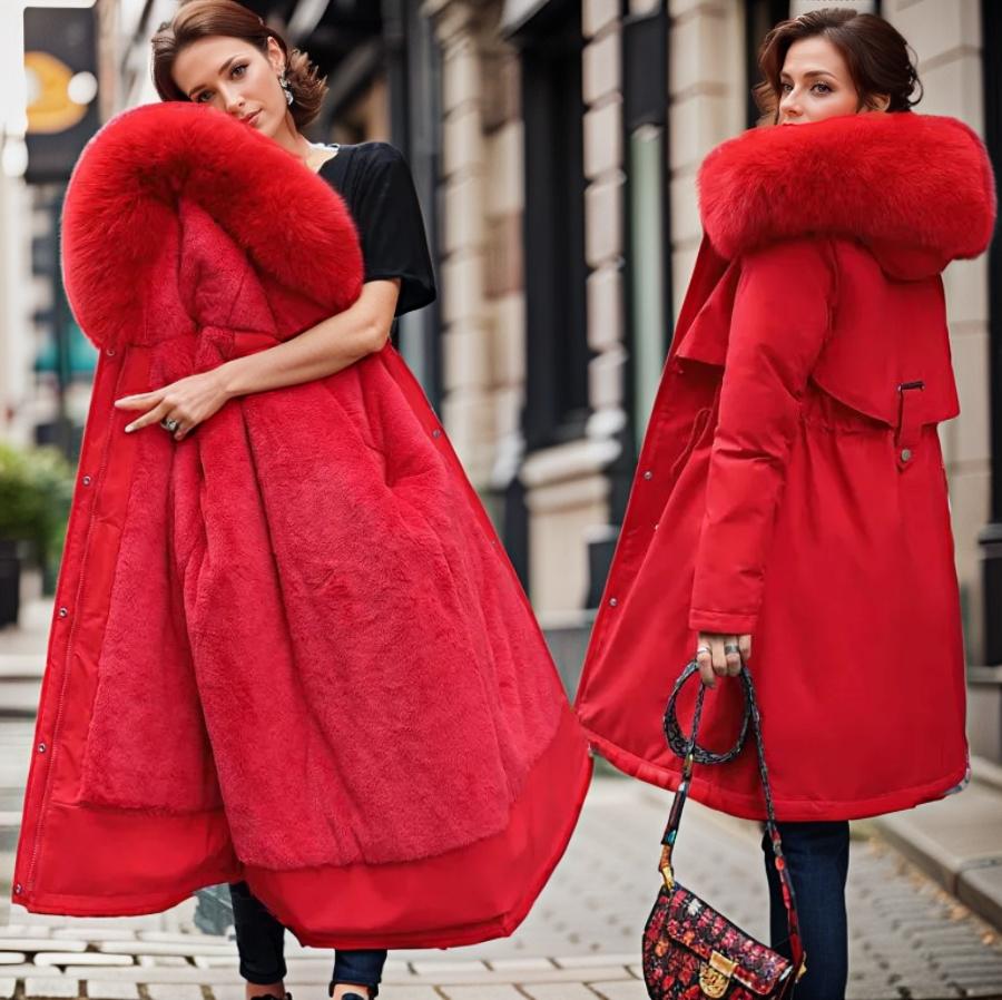 Warm women's hooded winter coat. Designed for ultimate protection against cold and wet weather.