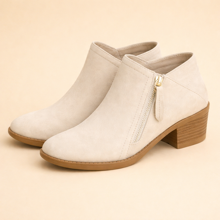 Versatile women's zipper ankle boots, offering both style and comfort for any outfit.