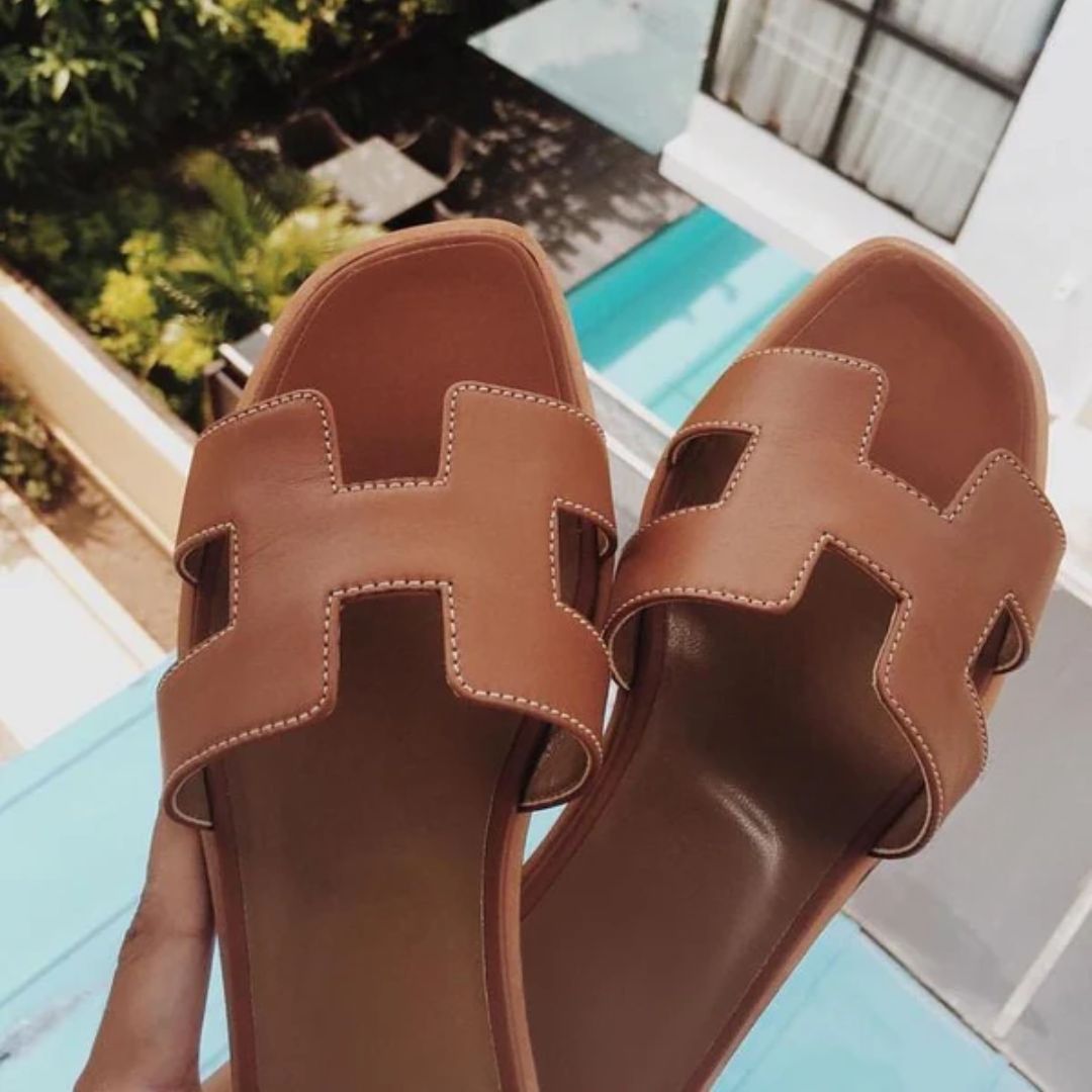 Fashionable women's Cora sandals with an open-toe, providing stylish comfort for casual summer outings and beachwear.