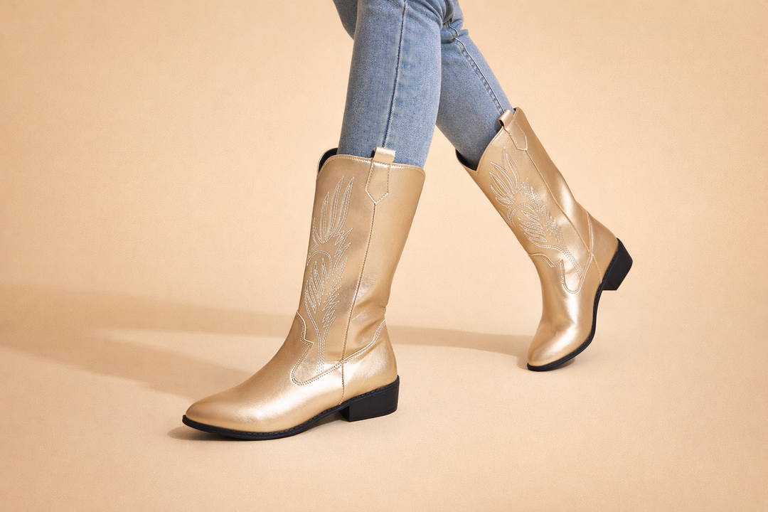 Elegant silver women's cowboy boots with a pointed toe & low heel. Classic western style, comfortable fashion footwear.