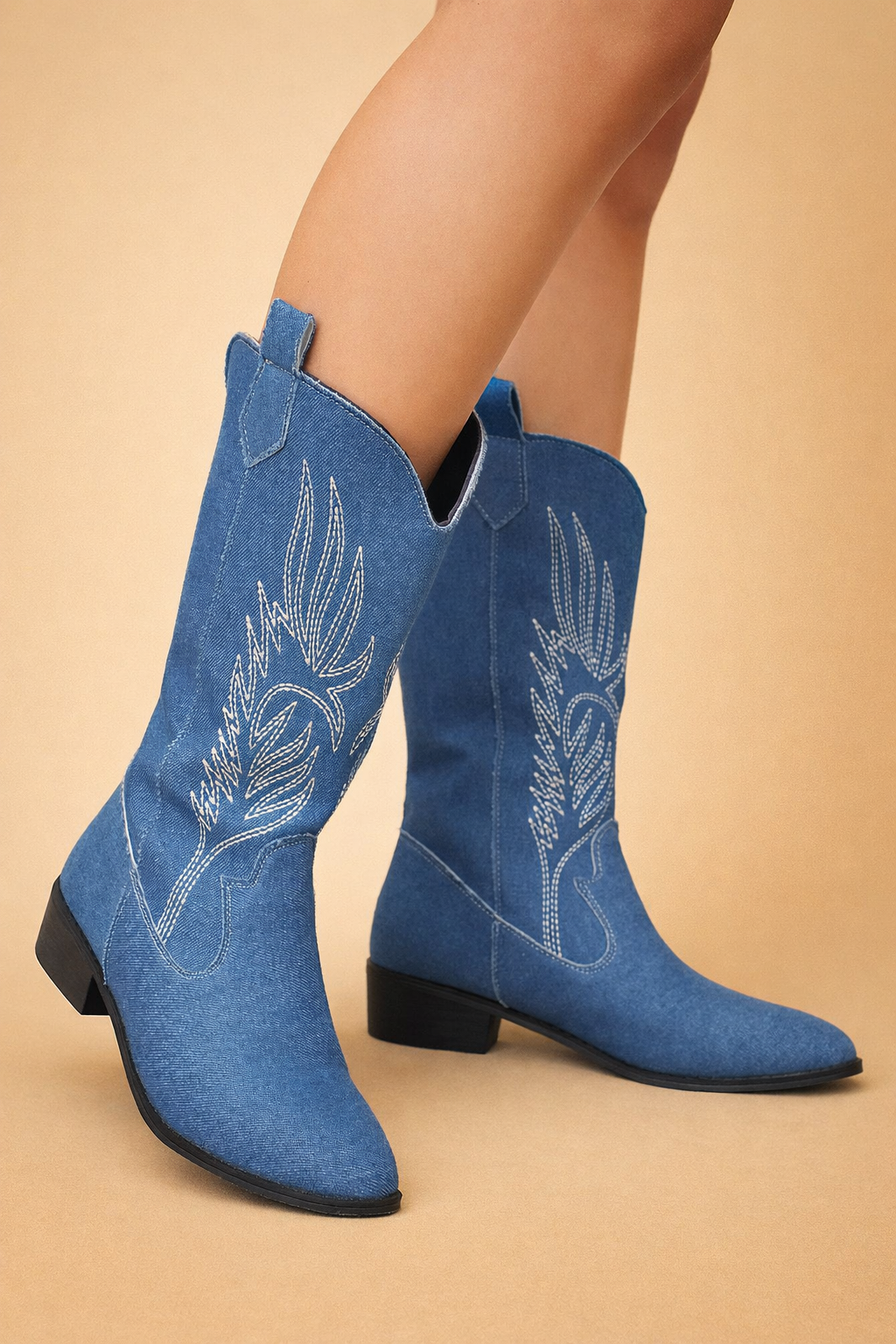 Comfortable women's western cowboy boots. Stylish pointed toe, low heel design for trendy everyday fashion footwear.