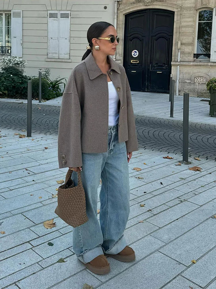 Versatile women's cropped boxy coat jacket in cream, ideal for fall fashion. A chic and stylish outerwear piece.
