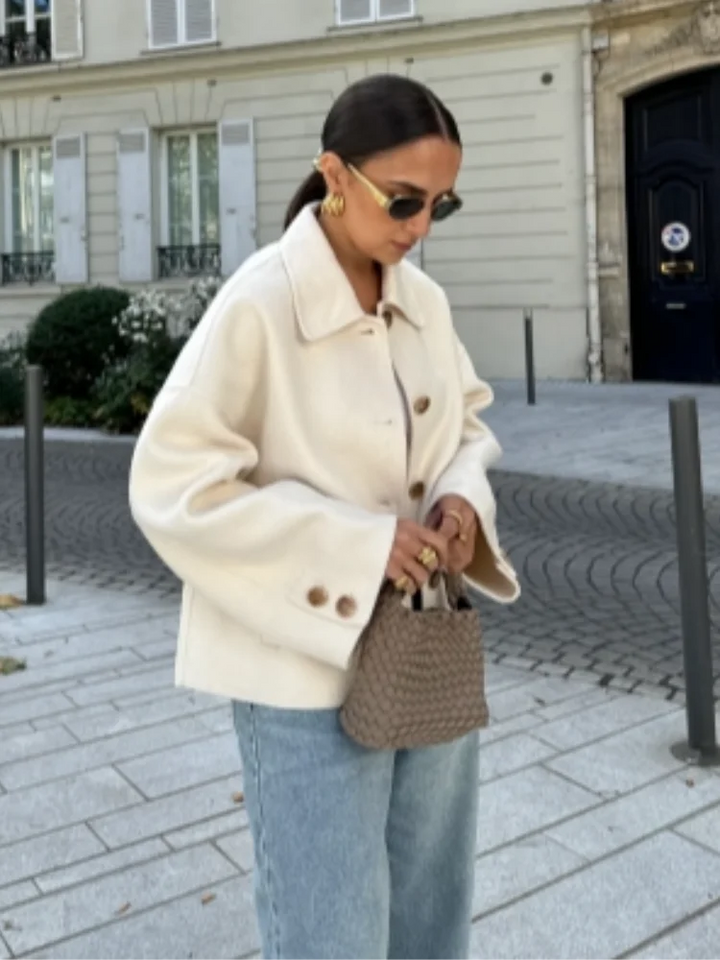 Trendy women's cropped boxy coat jacket. Stylish outerwear, ideal for fall & winter fashion versatility.