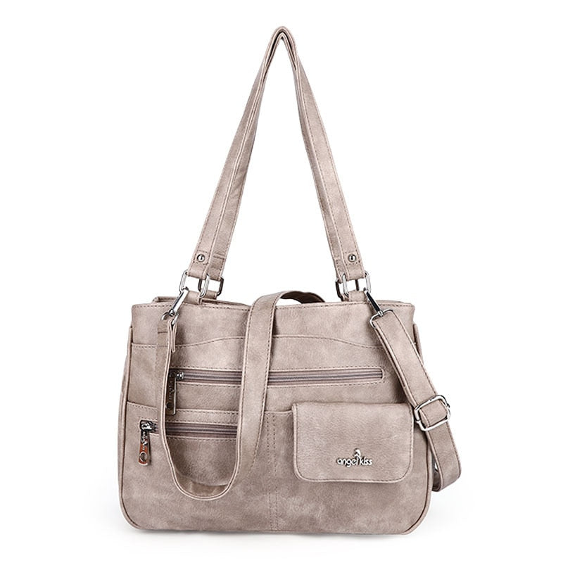 Stylish women's FlexiCarry PU leather multi-compartment shoulder & crossbody handbag for versatile everyday use.