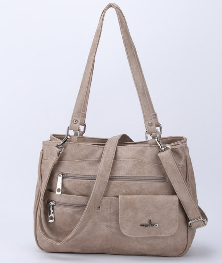 Organized women's FlexiCarry multi-compartment PU leather shoulder & crossbody bag, ideal for daily essentials.