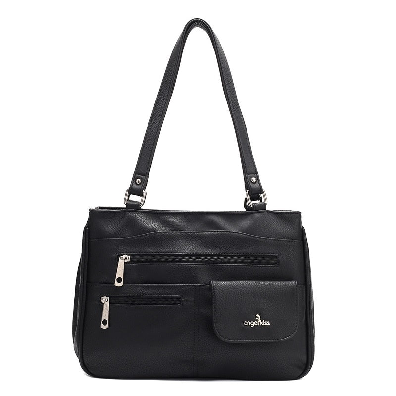 Women's FlexiCarry multi-compartment crossbody bag in PU leather, ideal for organized travel & daily essentials.