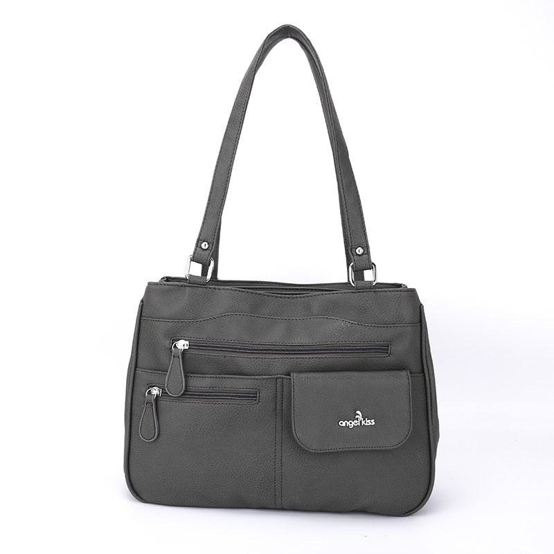 Elegant FlexiCarry women's crossbody handbag, a multi-compartment PU leather accessory for stylish everyday fashion.