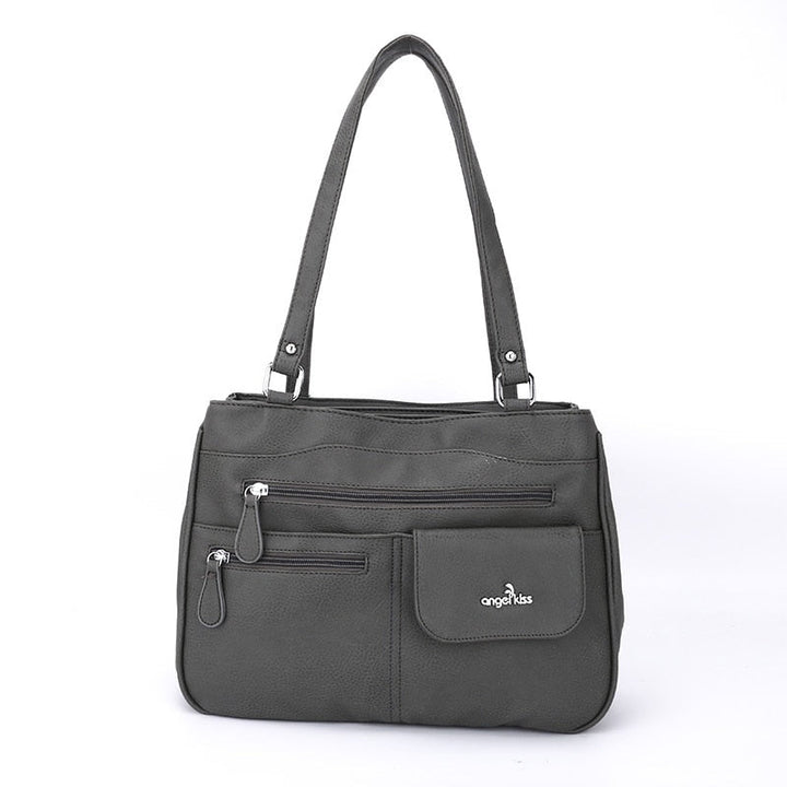 Elegant FlexiCarry women's crossbody handbag, a multi-compartment PU leather accessory for stylish everyday fashion.