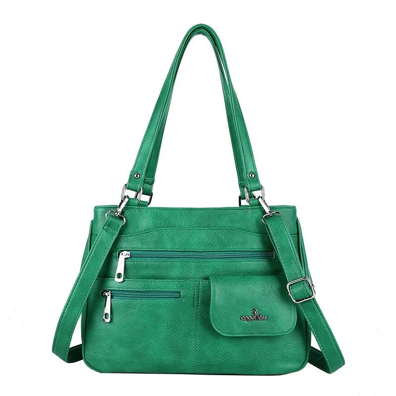Detailed view of the multi-compartment interior of the FlexiCarry women's PU leather shoulder & crossbody bag.