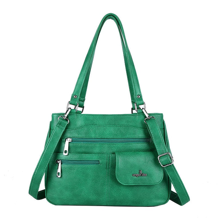 Detailed view of the multi-compartment interior of the FlexiCarry women's PU leather shoulder & crossbody bag.
