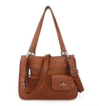 High-quality PU leather multi-compartment women's handbag. The FlexiCarry versatile shoulder & crossbody bag.