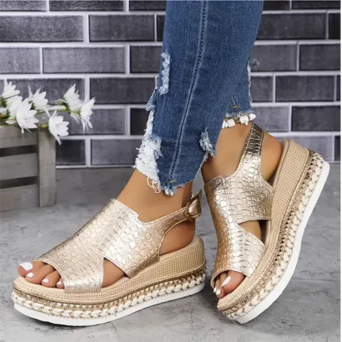 Stylish women's gold platform sandals with adjustable straps, perfect for summer comfort & fashion footwear.
