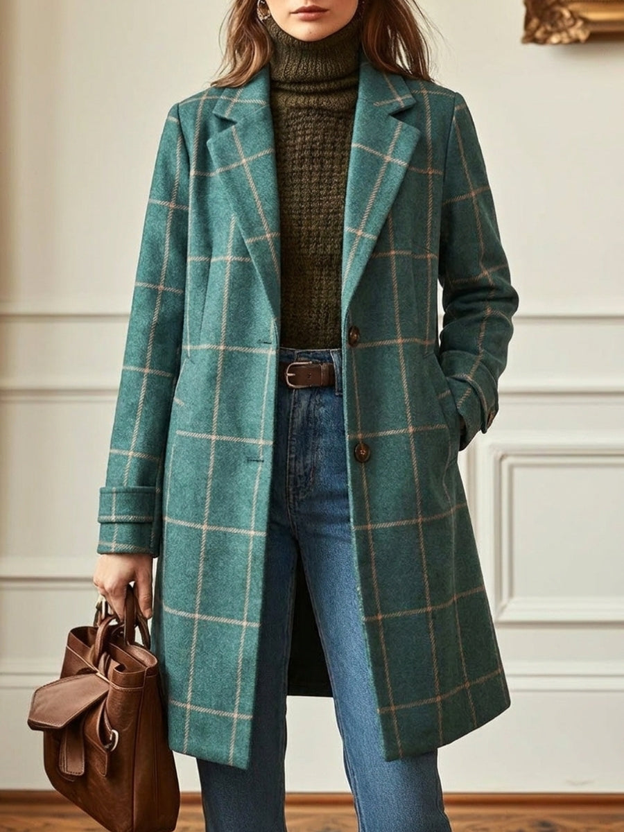 Stylish women's green checkered long lapel trench coat. Perfect outerwear for a fashionable winter look.