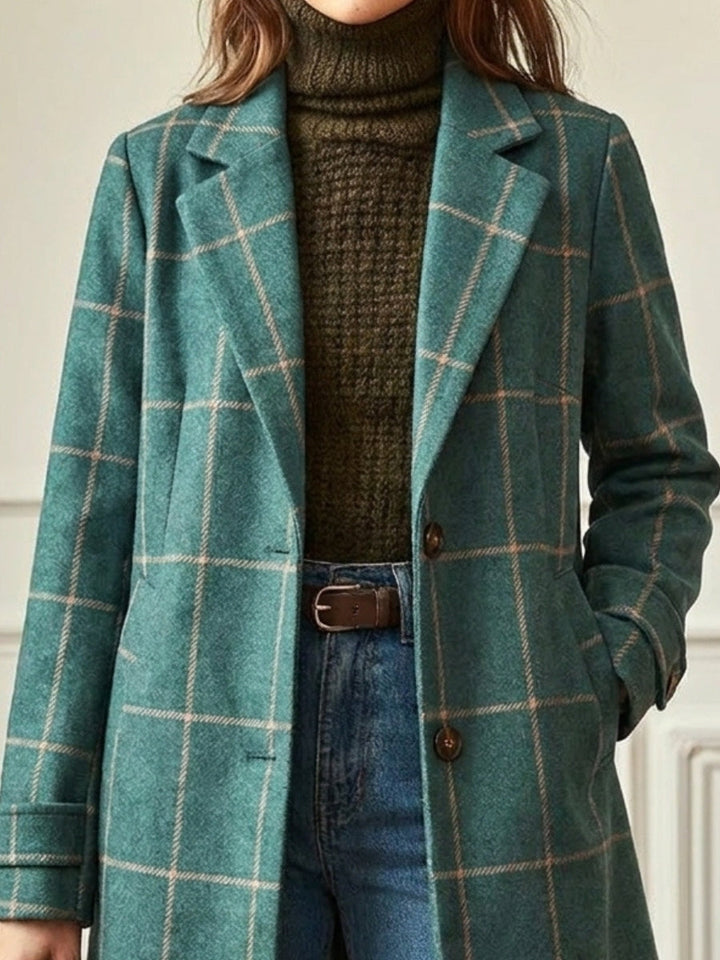 Women's long green checkered trench coat with elegant lapels, ideal for stylish outerwear and winter fashion.