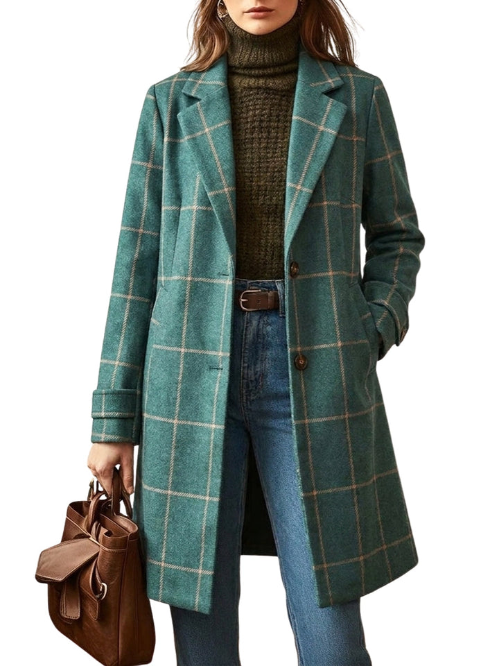 Women's stylish green checkered long trench coat with wide lapels. Essential outerwear for a trendy winter wardrobe.