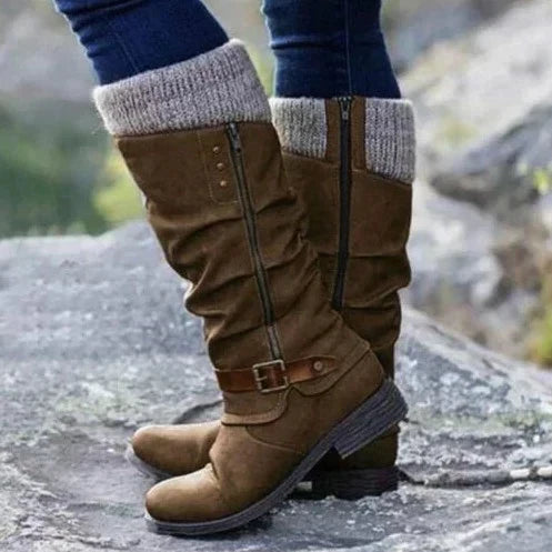Elegant knee-high women's boots with decorative buckles, cozy knit cuff, round toe & convenient side zipper.