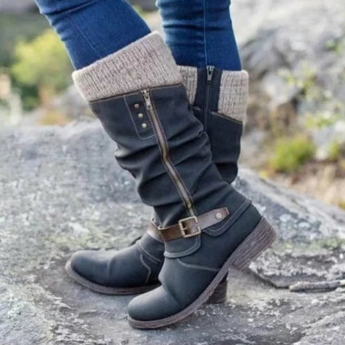 Fashionable women's knee-high buckle boots, synthetic suede & knit cuff, ideal for winter style & comfort.