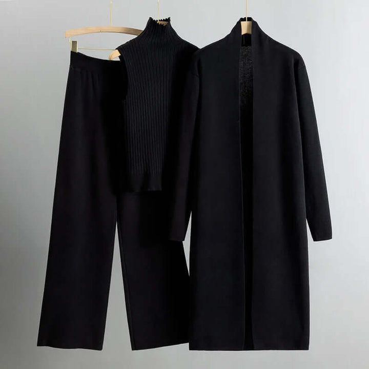 Comfortable women's knitwear set with a long cardigan, sleeveless top, and fashionable wide-leg trousers.