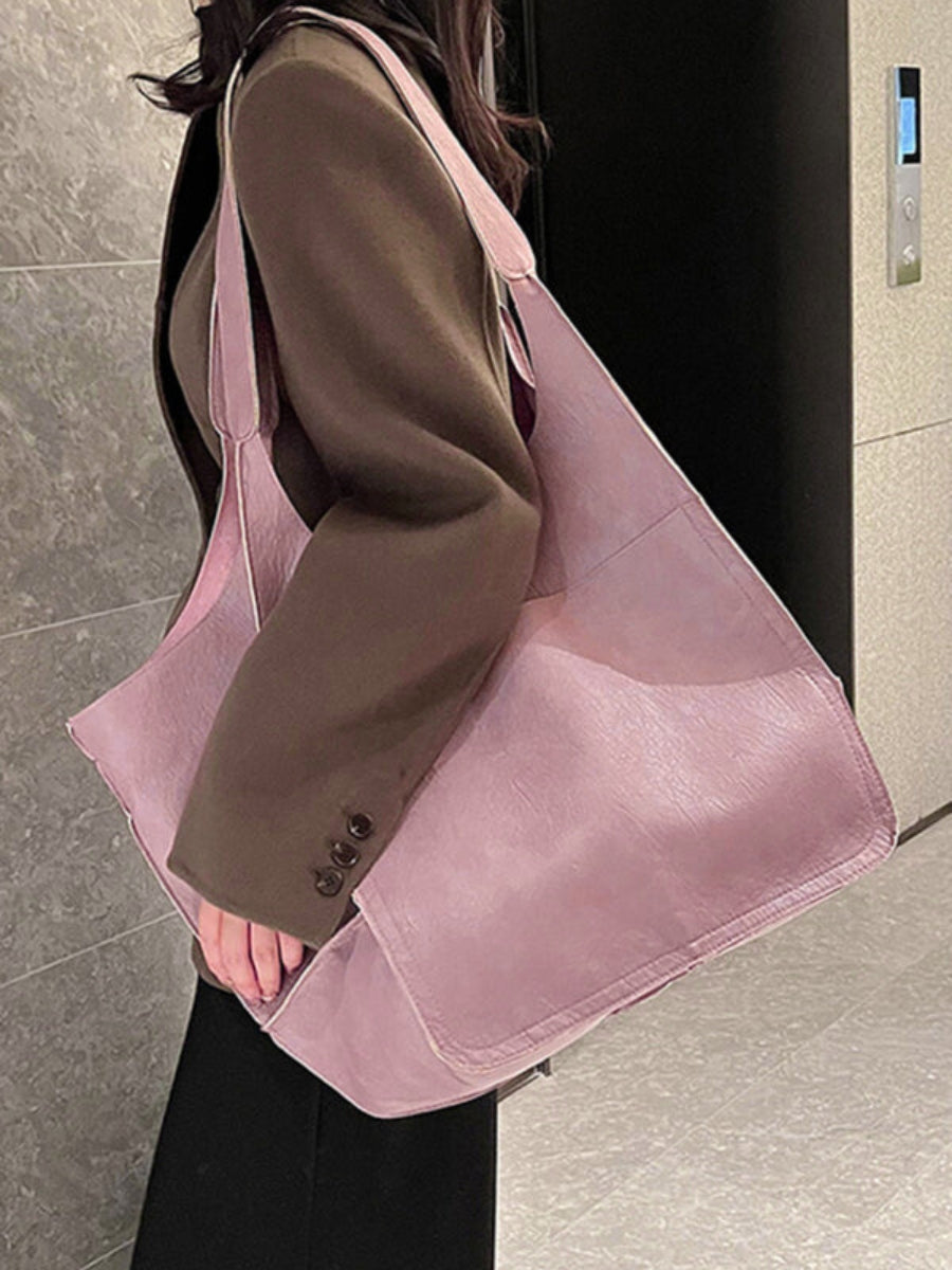 Stylish women's large tote bag, perfect as a shoulder travel bag, work bag, or everyday carry.