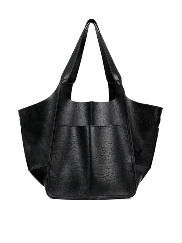 Must-have women's stylish large tote bag, a spacious shoulder bag ideal for travel and daily fashion.