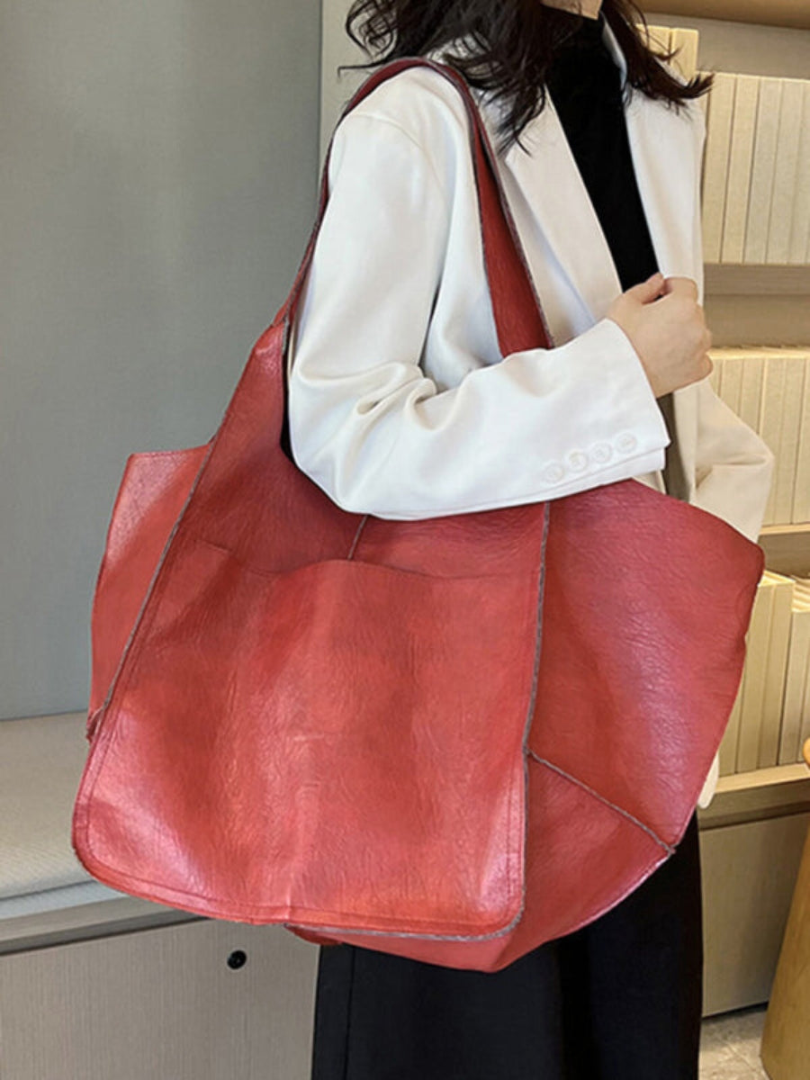 Spacious large tote bag for women, ideal shoulder travel bag with ample room.