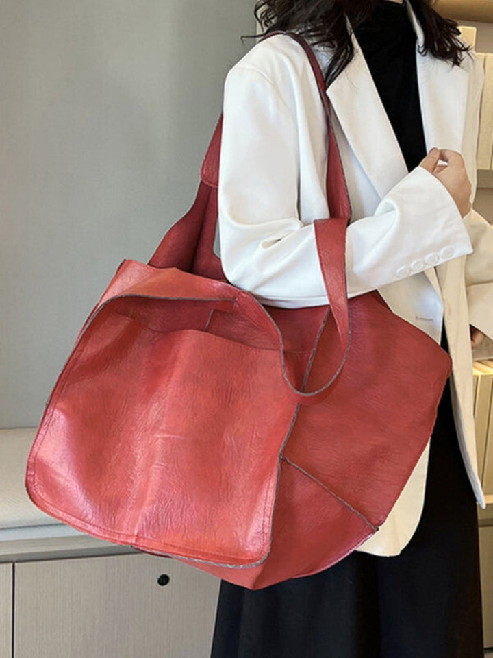 Elegant women's work bag, a spacious shoulder tote perfect for professional daily essentials.