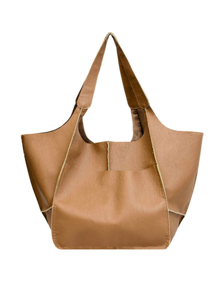 Chic women's large tote bag, a sophisticated shoulder bag for travel or daily wear.