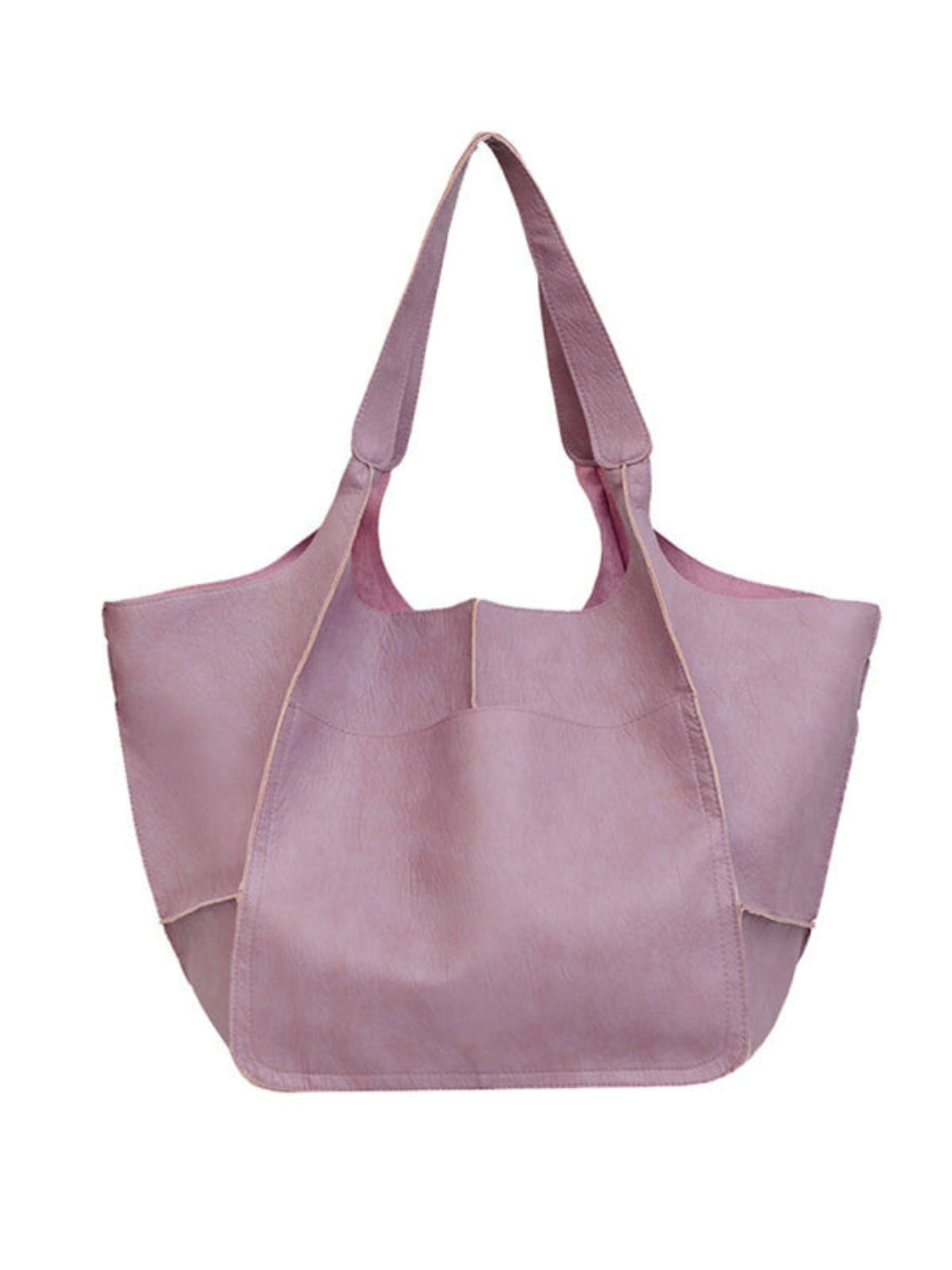 Women's large shoulder tote bag, a spacious and stylish travel accessory for all your needs.