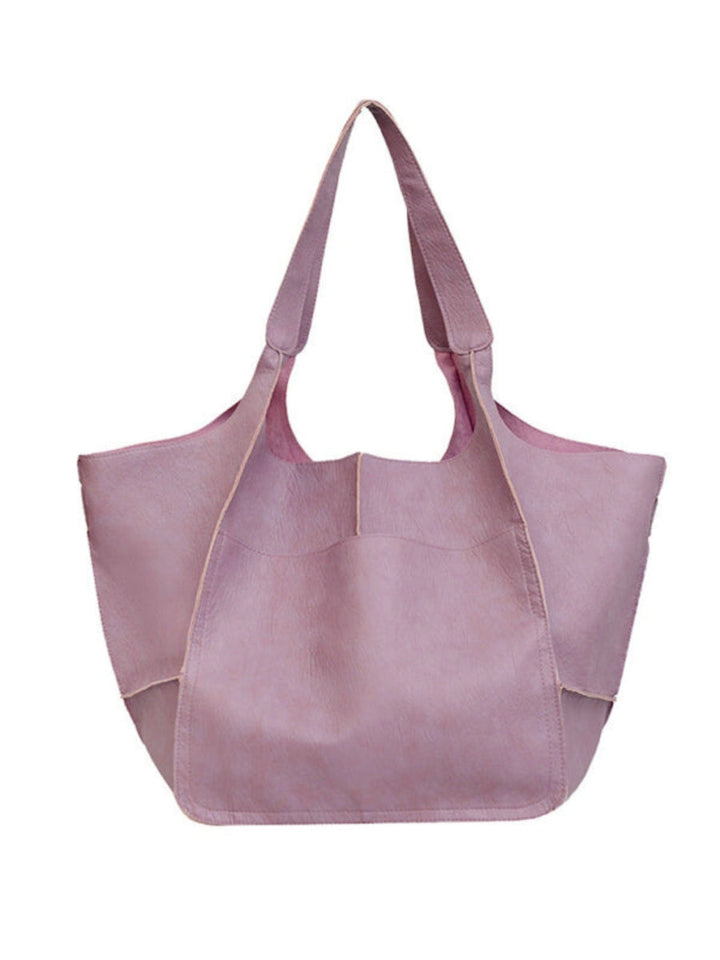 Women's large shoulder tote bag, a spacious and stylish travel accessory for all your needs.