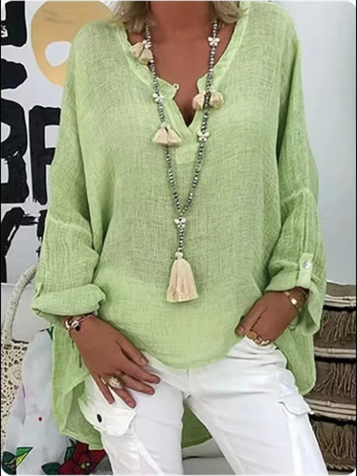 Elegant lightweight oversized women's top, designed for sophisticated comfort and a flowing silhouette.