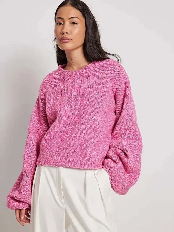 Casual women's long sleeve crop top with open back, great for everyday wear, offering comfort and style.