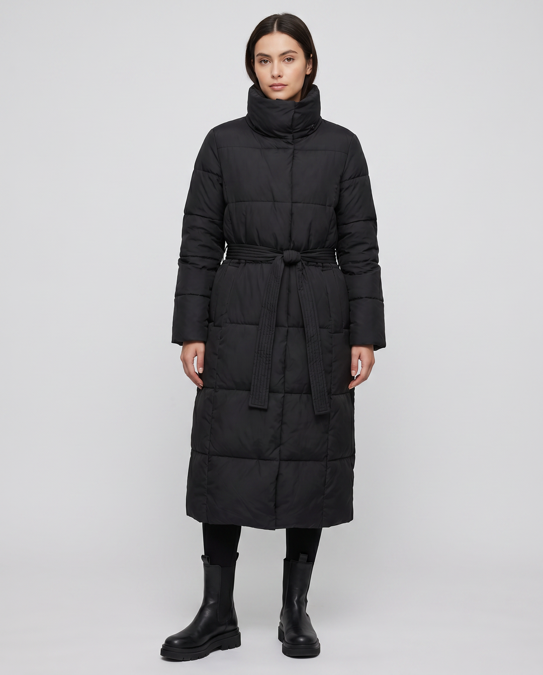 Comfortable women's long puffer jacket. Quilted design, warm & cozy for stylish cold weather fashion.
