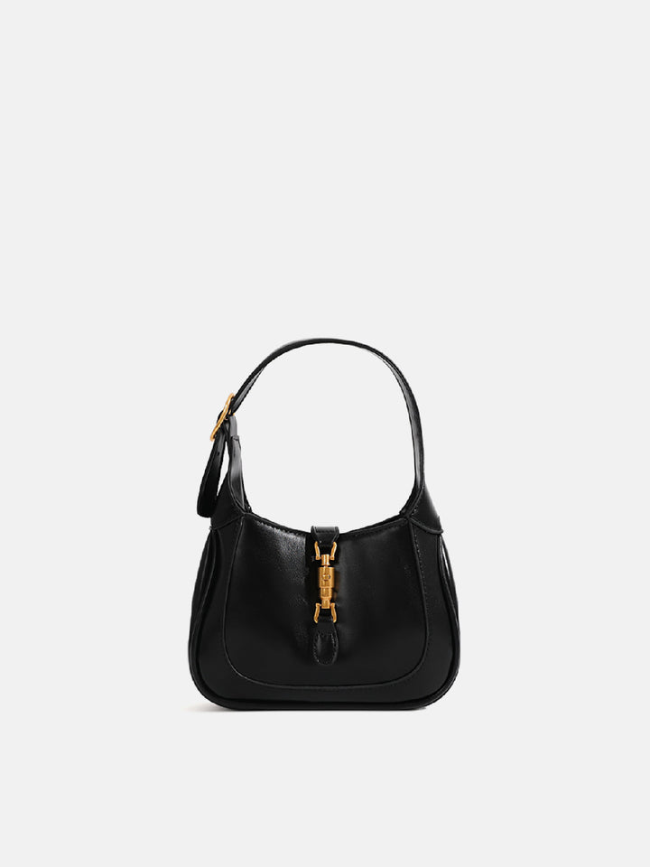 Fashionable pink mini shoulder bag, a stylish compact purse for women.