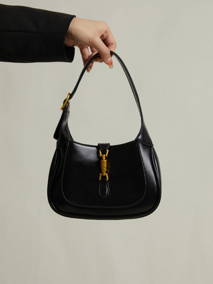 Versatile white compact shoulder bag for women, a chic and elegant accessory.