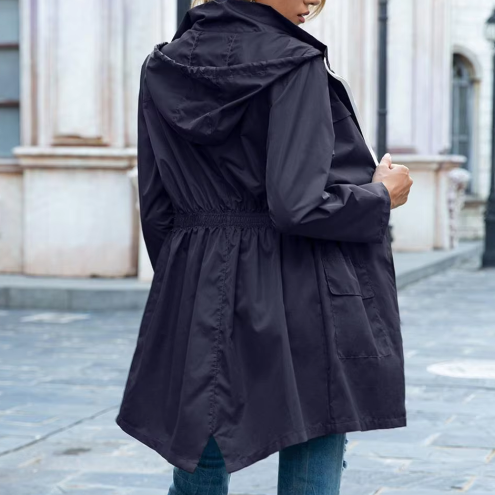 Sophisticated women's modern zip-up trench coat, stylish and versatile. Essential outerwear for spring & autumn.