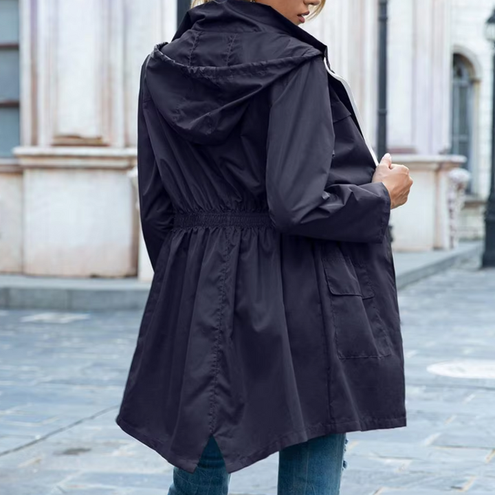Sophisticated women's modern zip-up trench coat, stylish and versatile. Essential outerwear for spring & autumn.