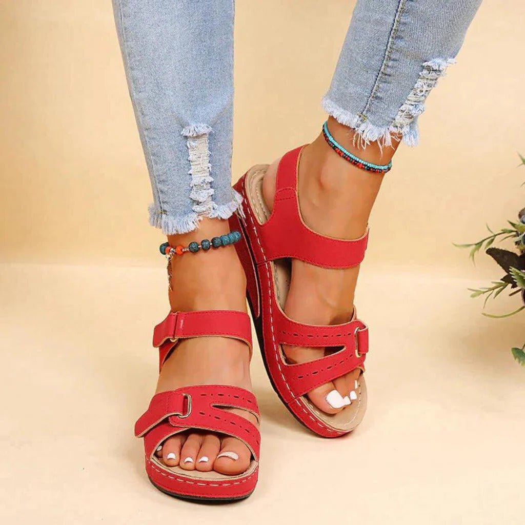 Breathable women's sandals, designed with superior arch support for all-day comfortable wear.