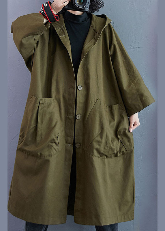 Full view of a longline women's oversized hooded trench coat, ideal for versatile fall & spring fashion. Buttoned front.