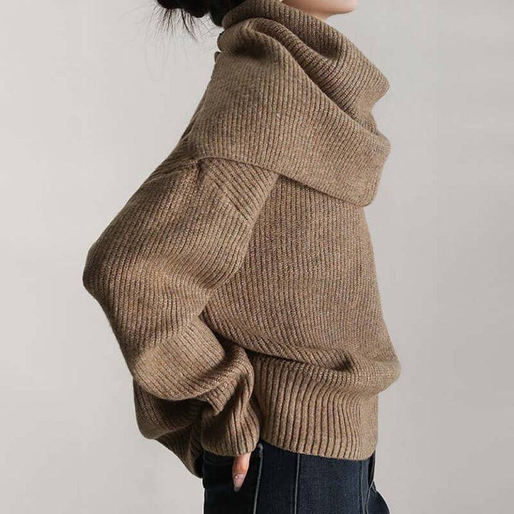 Warm & comfortable women's knit oversized turtleneck sweater, ideal for chilly days.