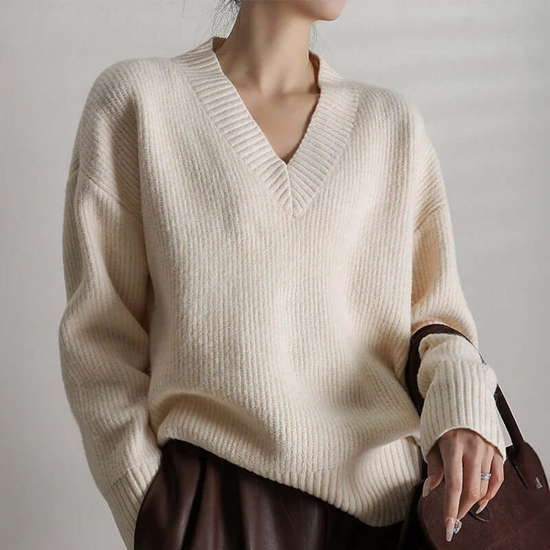 Cozy knit oversized turtleneck sweater for women, featuring a soft, comfortable texture.