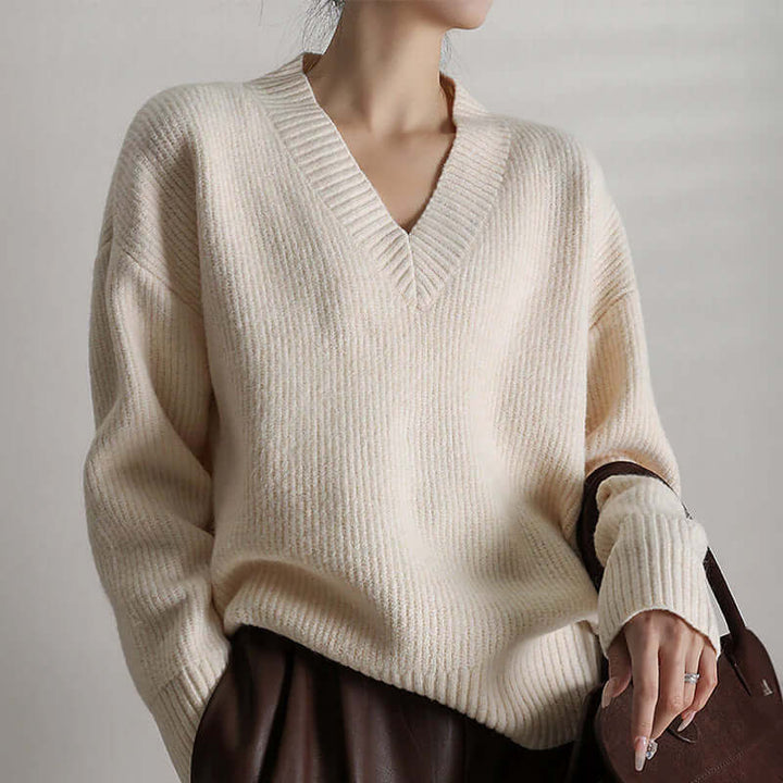 Cozy knit oversized turtleneck sweater for women, featuring a soft, comfortable texture.