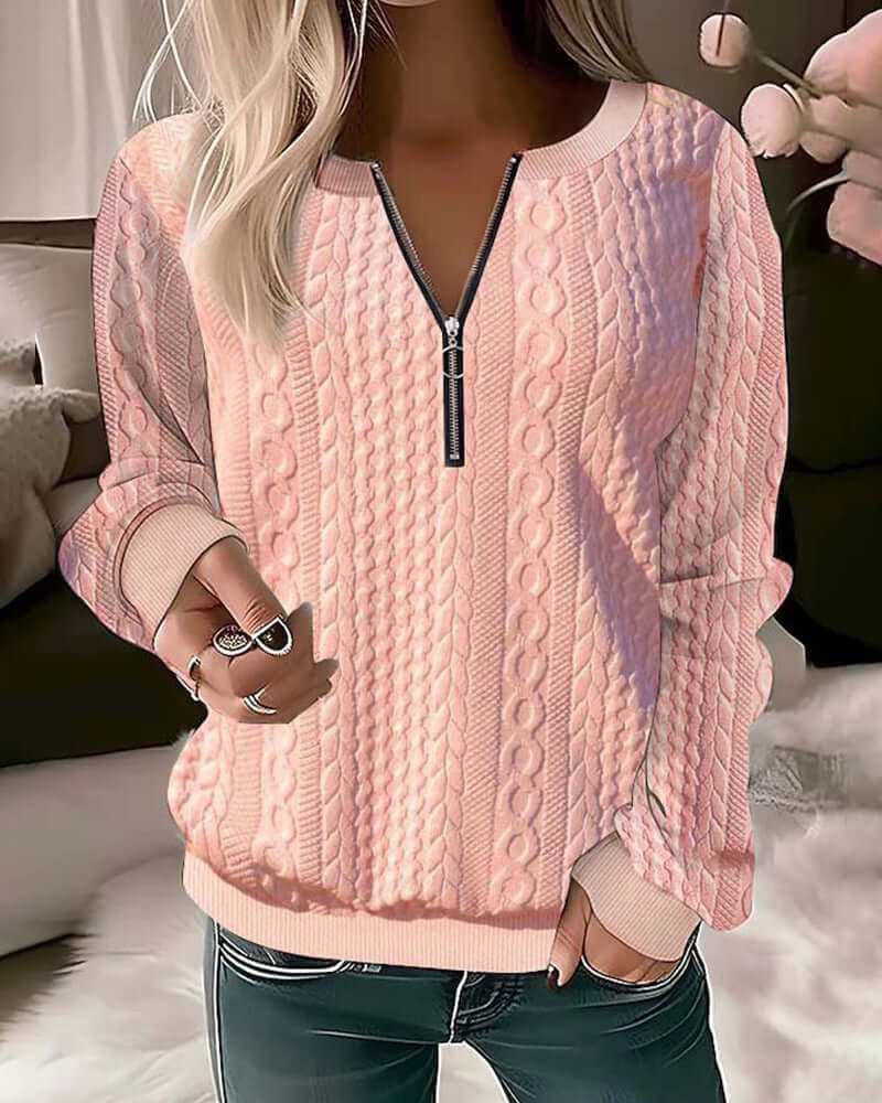 Stylish women's pink knitted half-zip pullover sweater. Cozy cable knit for autumn & winter fashion.