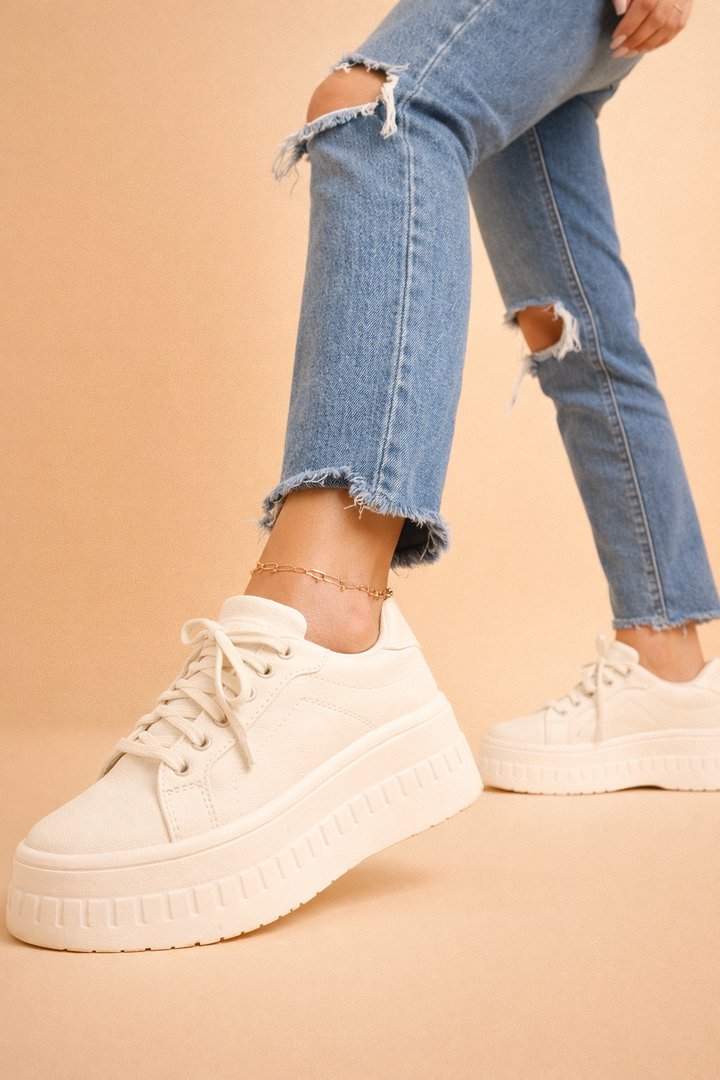 Trendy women's fashion sneakers with plateau sole. Elevates any casual chic outfit, offering stylish comfort.