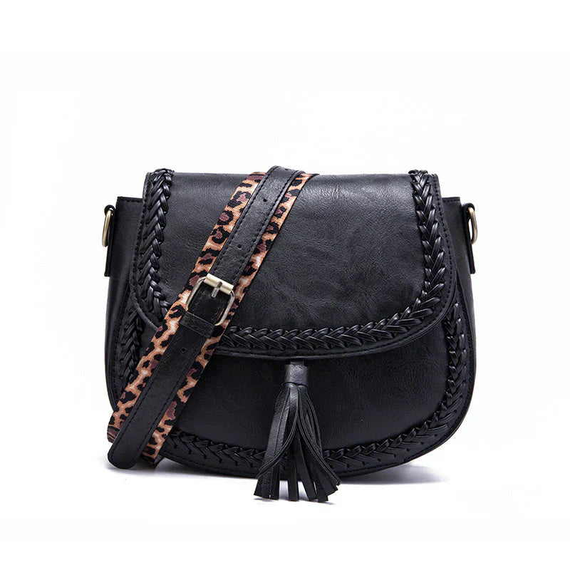Chic white faux leather small shoulder bag for women, with a stylish tassel, perfect for a fresh look.