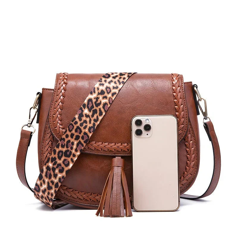 New faux leather women's small tassel bag, stylish shoulder design, perfect chic accessory for any outfit.